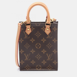 Louis Vuitton: Коричневая сумка 