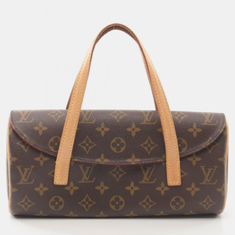 Louis Vuitton: Коричневая сумка на руку 