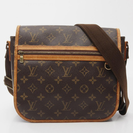 Louis Vuitton: Коричневая сумка 