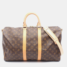 Louis Vuitton: Коричневая дорожная сумка  Keepall
