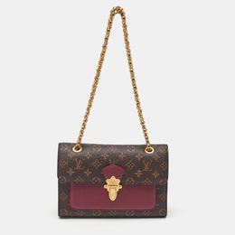 Louis Vuitton: Тёмная сумка 