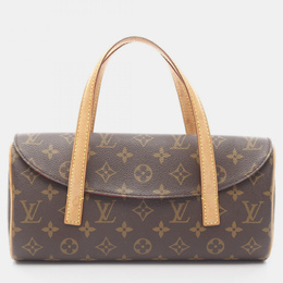 Louis Vuitton: Коричневая сумка 
