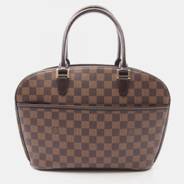 Louis Vuitton: Коричневая сумка 