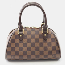 Louis Vuitton: Коричневая сумка 