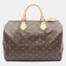 Louis Vuitton: Коричневая сумка  Speedy