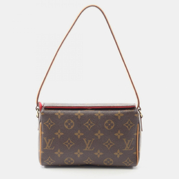 Louis Vuitton: Коричневая сумка 