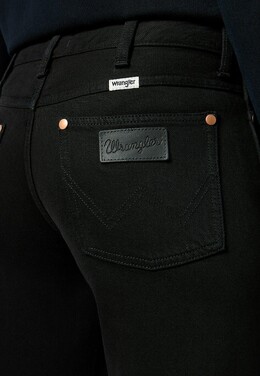 Wrangler: Расклешённые джинсы 