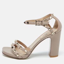 Valentino: Бежевые сандалии  Rockstud