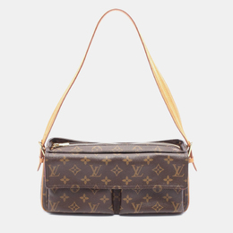 Louis Vuitton: Коричневая сумка 
