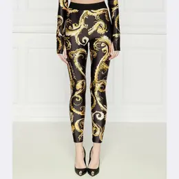 Versace: Чёрные легинсы 