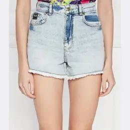 Versace: Джинсовые шорты 