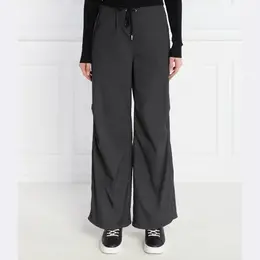 Juicy Couture: Брюки оверсайз 