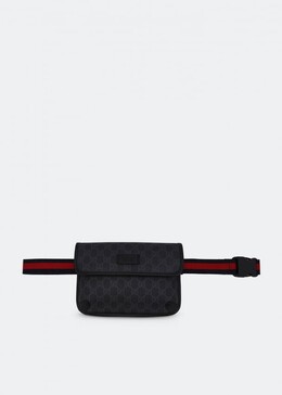 Gucci: Чёрная поясная сумка  GG