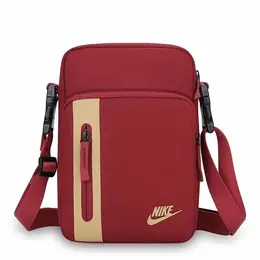 NIKE: Красная сумка 