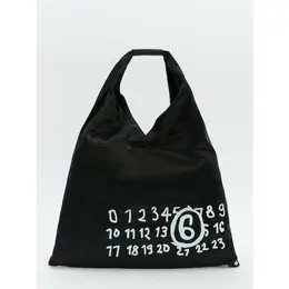 Maison Margiela: Чёрная сумка 