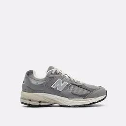 New Balance: Серые кроссовки 