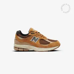 New Balance: Коричневые кроссовки  2002R