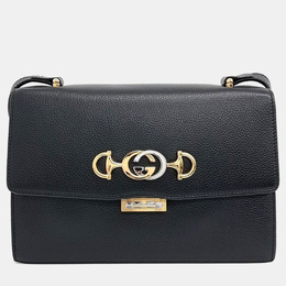 Gucci: Чёрная сумка 