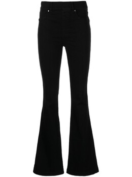 Spanx: Расклешённые джинсы 