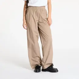Calvin Klein Jeans: Бежевые брюки 