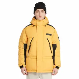 Timberland: Жёлтый пуховик 