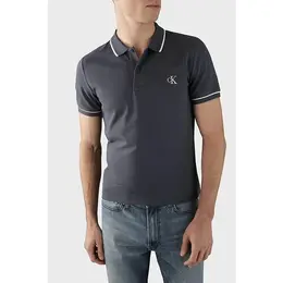 Calvin Klein Jeans: Чёрное поло 