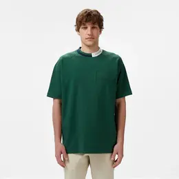 LACOSTE: Зелёная футболка 