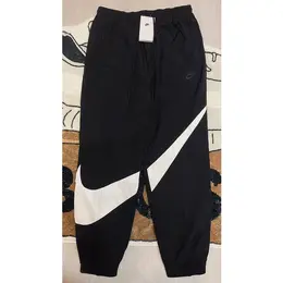 NIKE: Зауженные брюки  Sportswear