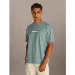 Calvin Klein Jeans: Голубая футболка 