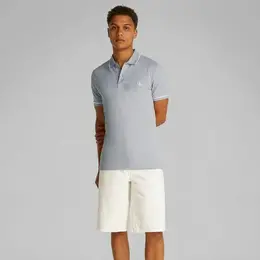 Calvin Klein Jeans: Серое поло 