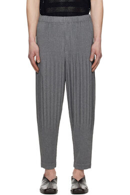 Homme Plissé Issey Miyake: Серые брюки 