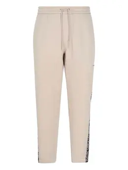 Calvin Klein Jeans: Бежевые брюки 