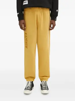 AAPE BY *A BATHING APE®: Жёлтые брюки 