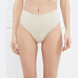 Spanx: Бежевые трусы 