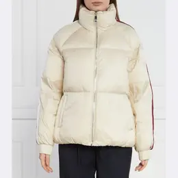 Tommy Hilfiger: Бежевый пуховик 