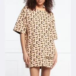 Kenzo: Бежевое платье 