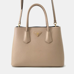 Prada: Бежевая сумка 