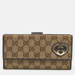 Gucci: Бежевый кошелёк  GG