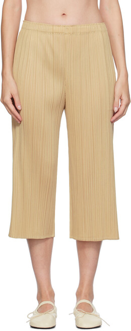 Pleats Please Issey Miyake: Бежевые брюки 