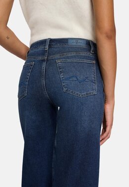 7 For All Mankind: Расклешённые джинсы 