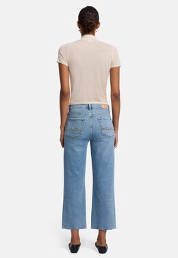7 For All Mankind: Расклешённые джинсы 