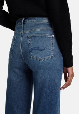 7 For All Mankind: Расклешённые джинсы 
