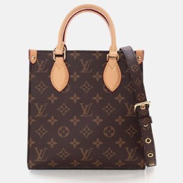 Louis Vuitton: Коричневая сумка-шоппер 