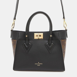 Louis Vuitton: Чёрная сумка 