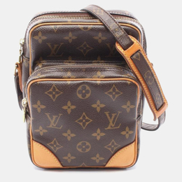 Louis Vuitton: Коричневая сумка 