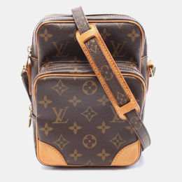 Louis Vuitton: Коричневая сумка 