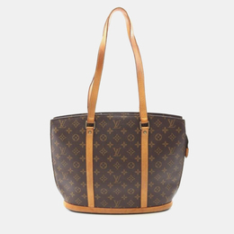 Louis Vuitton: Коричневая сумка 