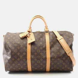 Louis Vuitton: Коричневая дорожная сумка  Keepall