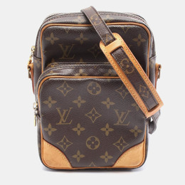 Louis Vuitton: Коричневая сумка 