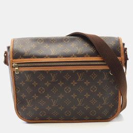 Louis Vuitton: Коричневая сумка 